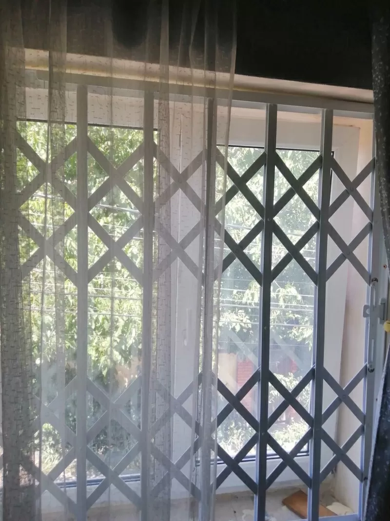 Розсувні решітки металеві на двері,  вікна,  балкони,  вітрини. Тернопіль 6