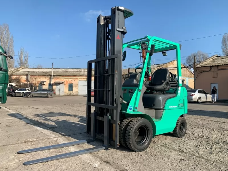 навантажувач вилковий Mitsubishi,  на спарці пневмо,  з щоглою триплекс 9